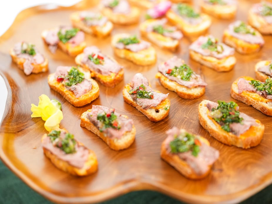 A seasonal holiday gathering with a catered table